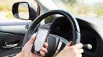 ЦОДД обнародовал условие штрафа за использование телефона за рулём